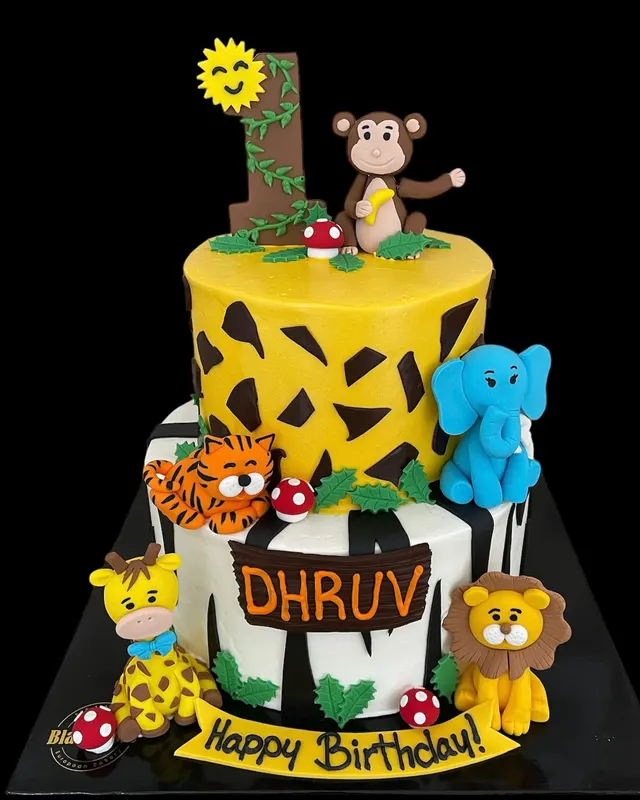 Jungle animal tiered birthday cake