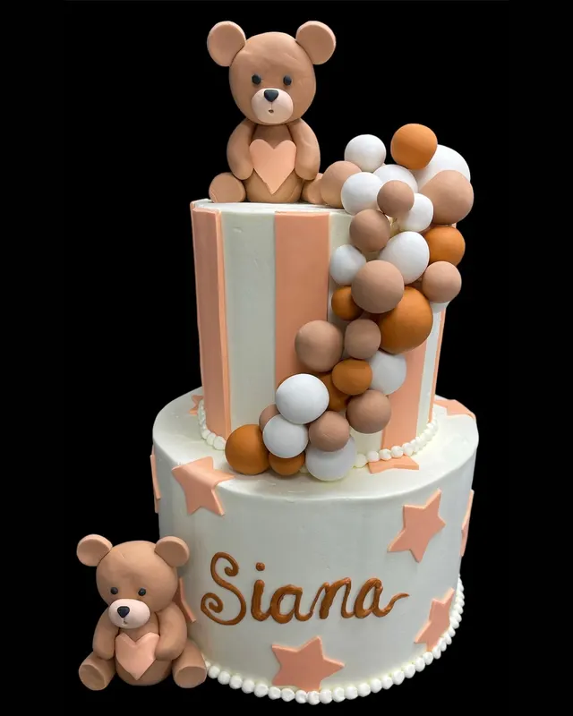 Teddy bear tiered cake with chocolate spheres